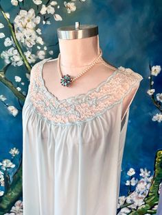 Vintage 70s Blue Pastel Floral Lace Empire Babydoll Lingerie Nightgown Slip Dress Boudoir ...would work as a maternity nursing lingerie, there are snaps at the shoulders for ease in nursing. by ALL size M please follow measurements for desired fit; measurements laying flat; armpit to armpit up to 23" waist up to 28" hip up to 29' top shoulder to bottom hem edge 45" fabric 30% polyester, 15% silk , 55% (cant read) Excellent Vintage Condition **pearl flower necklace is for display only, not for sa Vintage Sheer Sleepwear For Night, Sheer Blue Nightgown For Bedtime, Sleeveless Blue Nightgown For Wedding Night, Vintage Camisole Sleepwear For Loungewear, Blue Sheer Sleeveless Nightgown, Vintage Camisole Sleepwear For Bedtime, Vintage Camisole Sleepwear, Vintage Blue Sheer Sleepwear, Blue Sheer Vintage Sleepwear