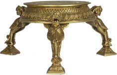 an ornately decorated gold plate with two cherubs on the top and bottom