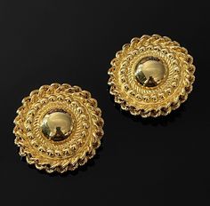 Luxurious, stunning and large Vintage signed Givenchy Clip On Retro Earrings. Real gold gilt with luxury Twisted patterns. Simple clip on ears. If you love stunning large size earrings like me, this is a must-have, and will sure get you lots of compliments ✨ Extremely rare vintage item. Only One! Have great collection value 💃  Measurements: 4cm x 4cm In mint vintage condition (one cushion slightly misplaced, doesn't affect the overall look) 👌  ✨FREE shipping worldwide  🚭 Smoke-free home Luxury Retro Clip-on Earrings For Women, Luxury Retro Clip-on Earrings, Luxury Vintage Clip-on Hoop Earrings, Luxury Yellow Gold Vintage Clip-on Earrings, Patterns Simple, Black Bangle, Earrings Real, Retro Earrings, Twist Pattern