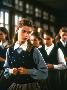 a group of young women standing next to each other