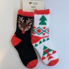 Tis' The Season For Hot Cocoa And Fuzzy Socks. The Fluffy Softness Of These Tucker + Tate Socks Gives Us A Reason To Look Forward To The Chilly Seasons Ahead. This Charming 2-Pack Has Two Distinctive Designs: One Boasts An Adorable, Geometric Christmas Tree Pattern, While The Other Features Our Favorite Red-Nosed Reindeer, Rudolph! These Socks Are New With Tags And Ready To Gift You Or A Loved One Toasty Coziness This Season. Cozy Christmas Socks For Gifts, Warm Casual Christmas Socks, Cozy Christmas Gift Socks, Warm Black Socks For Stocking Stuffers, Multicolor Christmas Socks For Stocking Stuffers, Black Winter Socks For Gifts, Black Winter Socks For Gift, Cozy Black Socks For Stocking Stuffers, Black Winter Socks As Gift