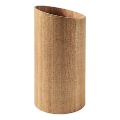 a tall wooden vase with a light brown finish