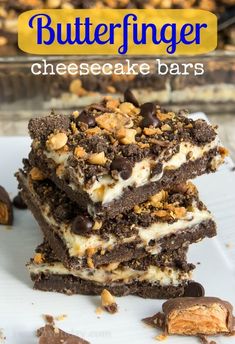 three pieces of chocolate cheesecake bars stacked on top of each other with the words butterfingerer cheesecake bars above them