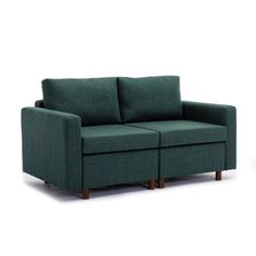 a green couch with two recliners sitting on it's legs and one arm extended