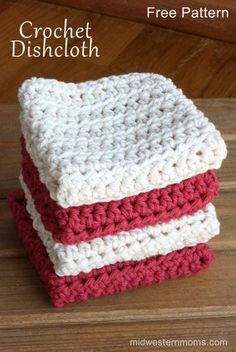 three crocheted dishcloths stacked on top of each other in red and white