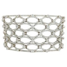 Beautiful white diamond round bracelet handmade in 18k white gold. Length is 7.5". Lattice design gives this bracelet a big look. Well made with attention to detail. Round Bracelet, Modern Bracelets, Lattice Design, White Gold Bracelet, Bracelet Handmade, White Diamond, Diamond White, Lattice, Handmade Bracelets