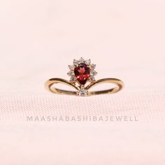 Pear Cut Natural Red Garnet Solitaire Ring, Engagement Ring, 18k Gold Vermeil Ring, Birthstone Ring, Dainty Weeding Ring, Garnet Jewelry SHOP LINK:- https://www.etsy.com/shop/MaaShabashibaJewell?ref=seller-platform-mcnav 》D E T A I L S《 Gemstone: 1) Natural Garnet 2) Natural White Topaz Gem Color: 1) Red 2) White Gem Shape: 1) Pear 2) Round Gem Category: Cut Gem Size: 4x6 mm Oval Metal: 925 Sterling Silver Purity: 925 Parts Per 1000 Setting Type: Prong Set Silver Polish: High Ring Size: All Size Gold Garnet Cluster Promise Ring, Formal Ruby Stackable Rings Fine Jewelry, Ruby Rings For Valentine's Day Formal Occasions, Formal Ruby Rings For Valentine's Day, Valentine's Day Formal Ruby Rings, Garnet Ring With Prong Setting, Yellow Gold Garnet Wedding Jewelry, Red Ruby Pear-shaped Rings, Pear-shaped Ruby Rings In Red