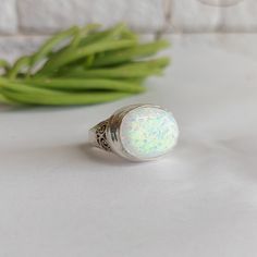 White opal ring, oval shape impressive, powerful and very beautiful handmade ring, Made of 925 silver material. Great gift idea for Valentine's day gifts, Anniversary gifts, and Women's gifts. Size white opal stone:13\18mm Size to order: 6-16U.S 🔸 All my creations are made by me from Fine Materials, Gemstones, and of high quality. 🔸 Unique Techniques in different textures styles and trends Lots of investment to give you one more moment of joy. 🔸 Ask me any question, my customer service is ava White Oval Cabochon Opal Ring, Opal Oval Cabochon Ring For Gift, Opal Oval Cabochon Ring As Gift, Oval Cabochon Opal Ring Gift, Handmade Oval Opal Ring For Anniversary, White Opal Oval Cabochon Ring, White Cabochon Opal Ring For Gift, Handmade Oval White Opal Ring, Handmade White Oval Opal Ring