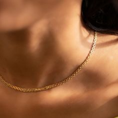 This shiny gold chain necklace from our signature O Collection, is made with the finest Italian Bismark chain. Pair it with other necklaces from this collection. Our patented connectors let you easily link and layer necklaces in any order you desire. Italian Bismark chain, width 2.3mm Adjustable chain: 15-17in (38-43cm) Gold Vermeil Spring clasp closure Hypoallergenic, lead and nickel free #028G Double Strand Gold Plated Figaro Chain Necklace, Gold Plated Double Strand Figaro Chain Necklace, Minimalist Double Chain Yellow Gold Necklace, Minimalist Double Chain Link Necklace, Dainty Double Chain Link Necklace, Modern Yellow Gold Double Chain Necklace, Dainty Yellow Gold Double Chain Necklace, Gold Plated Double Chain Link Necklace, Gold Plated Link Chain Necklace For Layering