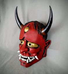 Wearable Hannya or Oni style maskBased off traditional Japanese Noh and theater Masks.Made of PLA and hand painted in acrylics. This mask is large enough to be wearable by most people.  This demon mask is painted in all red, but if you would like it in a different color please state in a message along with your order.Inside dimensions are: 10 H x 6 W in / 255 H x 150 W mmOverall Dimension: 13.25 H x 9.5 W in / 335 H x 240 W mm Each piece is individually made to order so keep in mind: It will pos Artistic Red Masks And Prosthetics For Festivals, Artistic Red Masks And Prosthetics For Costume Party, Traditional Red Masks And Prosthetics For Costume Party, Artistic Red Mask For Costume Party, Artistic Red Masks For Costume Party, Artistic Red Masks And Prosthetics For Costume, Traditional Red Masks And Prosthetics For Costume, Traditional Red Costume Masks And Prosthetics, Artistic Costume Masks For Festivals