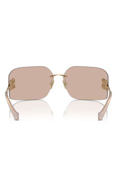 Rimless frames add a glamorous vibe to Italian-made sunglasses fashioned with signature logo hardware at the temples. 80mm lens width; 14mm bridge width; 110mm temple length 100% UV protection Adjustable nonslip nose pads Metal Made in Italy Miu Miu Tinted Sunglasses, Elegant Rimless Shield Sunglasses With Gradient Lenses, Miu Miu Gold Sunglasses With Tinted Lenses, Miu Miu Gold Tinted Sunglasses, Miu Miu Elegant Gold Sunglasses, Chic Miu Miu Sunglasses With Polarized Lenses, Elegant Gold Miu Miu Sunglasses, Chic Miu Miu Polarized Sunglasses, Elegant Rimless Shield Sunglasses With Mirrored Lenses