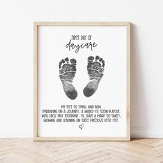 a framed poster with a baby's footprints and the words, trust day of anyone