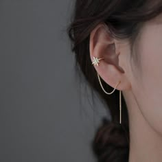 These earrings will come as shown as in pictured. Ear Cuff earrings good for casual use or events. These dainty set is a lovely gift idea for someone special. They are selling as a PAIR. 𝐂𝐚𝐫𝐞 𝐢𝐧𝐬𝐭𝐫𝐮𝐜𝐭𝐢𝐨𝐧𝐬 To maintain quality and color, keep jewelry away from water, moisture, chemicals, etc. and handle with clean hands. I also recommend occasionally cleaning the item with a cloth and storing it in a clean place such as a sealed bag or compartment. Ear Cuffs Silver, Ear Cuffs Gold, Gold Ear Cuffs, Silver Ear Cuffs, Earring Cuff Chain, Ear Cuff Chain, Chain Threader Earrings, Gold Ear Cuff, Star Chain