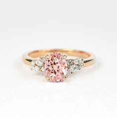 This beautiful ring comes with a center oval shape 1.5ct lab-grown Peach Sapphire and 6 round-shape diamonds and 4 marquise shape Diamonds. Available in yellow gold, rose gold, white gold or platinum. It is a perfect choice for those who are looking for a dainty engagement ring in 9k/14k/18k Yellow, Rose or White Gold. It is also a great gift for Christmas, Valentine's day, birthday, anniversary or for celebration for any special occasion. ✯✯ Free UK and USA shipping ✯✯ ✯ ✯ No Custom Charges for Peach Diamond Rose Gold Ring, Pink Diamond Engagement Ring Rose Gold, Light Pink Sapphire Engagement Ring, Supernatural Academy, Wedding Rings Pink Sapphire