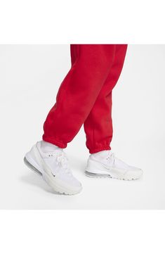 Get ready for the weekend in these high-rise, brushed-fleece sweatpants that fit loose through the hip and thigh for all-day comfort. 29 1/2" inseam; 12" leg opening; 13" front rise; 18" back rise (size Medium) Elastic/drawstring waist On-seam pockets 80% cotton, 20% polyester Machine wash, tumble dry Imported White Nike Relaxed Fit Sweatpants, Nike Moisture-wicking Athleisure Sweatpants, Nike Cotton Full-length Sweatpants, Nike Relaxed Fit Moisture-wicking Sweatpants, Nike Sportswear Phoenix Fleece Women's High-waisted Wide-leg Sweatpants, Fleece Sweatpants, Drawstring Waist, Nike Sportswear, Sweatpants