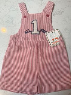 "Made in USA - labeled sz 3T  True vintage runs small - Good vintage condition-brand new with tags-Deadstock -no issues / smoke free home / made in the USA / elastic back waist 9 1/2\"-10\"/ length (top of shoulder strap to bottom leg) 17 1/2\"/ inseam 1 1/2\"/ length (center front bib to crotch intersection) 13 1/2\" Seersucker material (42)" Vintage Cotton Overalls For Playtime, Jon Jon, Vintage Toddler, Baby Boy Clothing Sets, Clothing Sets, Boys Clothing, True Vintage, Home Made