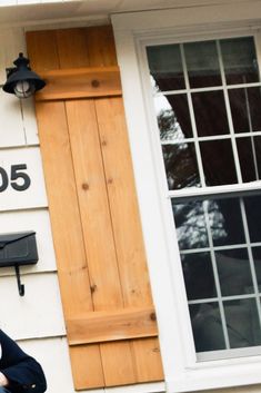 an image of a window and shutters on the side of a house that says how to make wood shutters