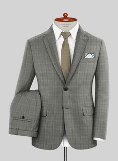 If you're truly fashionably inclined, an infusion of our Scabal Cosmopolitan Glen Gray Wool Suit is essential. Tailored with superfine merino wool, this distinguished suit showcases a plaid pattern crafted from intersecting lines of black and white yarns, all resting on a gray foundation. Moreover, it offers exceptional versatility for your wardrobe, making it perfect for various occasions such as weddings, proms, or even a day at the races.  Look Includes    Scabal Cosmopolitan Glen Gray Wool Green Tweed Suit, Intersecting Lines, Tailor Made Suits, Grey Wool Suit, Day At The Races, Green Flannel, Linen Suits, Green Suit, Tweed Suits