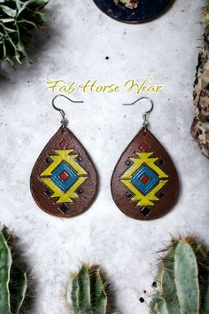 These tear drop  earrings are made with veg tan leather. Handmade Leather Teardrop Earrings, Brown Leather Teardrop Jewelry, Festival Teardrop Earrings With Ear Wire, Brown Hand Tooled Dangle Earrings, Hand Tooled Brown Dangle Earrings, Hand Tooled Teardrop Bohemian Earrings, Artisan Leather Teardrop Earrings, Brown Hand Tooled Drop Earrings, Leather Teardrop Jewelry