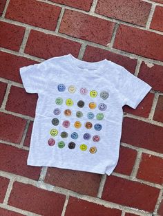 This All the Moods T-shirt is so fun and colorful for any little one! *Also available in an adult t-shirt and crewneck Playful Character Print T-shirt With Relaxed Fit, Gray T-shirt With Cartoon Print And Crew Neck, Playful Unisex T-shirt With Character Print, Trendy Spring Playtime T-shirt, Playful Crew Neck T-shirt For Playtime, Cute Multicolor Graphic Print T-shirt, Unisex Short Sleeve T-shirt For Playtime, Screen Print Short Sleeve T-shirt For Playtime, Cute Letter Print T-shirt For Playtime