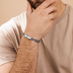 "This simple and beautiful stylish men's stainless steel bracelet comes with with 5 custom stainless steel beads, each with an inscription of its own. The bracelet comes with 5 beads, you can decide which to personalize and the rest will remain empty. * Waterproof and Sweatproof. * Font color: Black * Bracelet length: 7\" (18cm). * Bracelet comes with a 2\" (5 cm) extension chain. * Please mention your font preference when ordering These make the perfect gift. Every purchase is carefully package Jubilee Bracelet In Stainless Steel For Friendship, Adjustable Chain Bracelet For Father's Day Gift, Adjustable Chain Bracelet For Father's Day, Stainless Steel Braided Bracelets With Clasp As Gift, Silver Wristband With Stainless Steel Clasp As Gift, Stainless Steel Braided Bracelet As Gift, Father's Day Gift Bracelet Strap Jewelry, Adjustable Jubilee Bracelet For Birthdays, Father's Day Stainless Steel Jubilee Name Bracelet