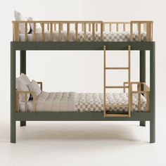 the bunk bed is made from wood and has two sets of mattresses on each side