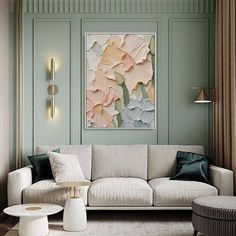 a living room with green walls and white furniture