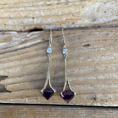 "Beautiful deep purple amethyst earrings 2 1/4\" tall with ear wires by 9/16\" wide at the widest spot, handmade in sterling silver 925 with 12mm gorgeous round Madeira citrine stones and 3mm round cubic zirconia (cz) stones...these are gorgeous earrings!" Purple Amethyst Teardrop Crystal Earrings, Purple Gemstone Accented Drop Earrings, Purple Drop Earrings With Gemstone Accents, Lavender Amethyst Earrings With Gemstone Accents, Purple Crystal Gemstone Drop Earrings, Silver Amethyst Drop Crystal Earrings, Silver Amethyst Drop Earrings, Purple Amethyst Earrings With Gemstone Accents, Purple Amethyst Jewelry For Pierced Ears