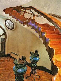 a spiral staircase in a home with decorative decorations