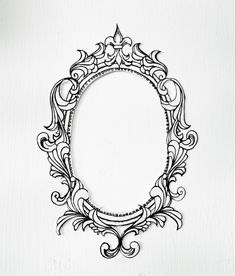 a black and white photo frame with an ornate design