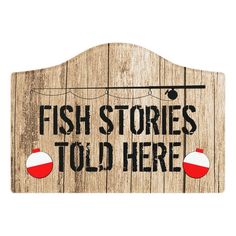 a wooden sign that says fish stories told here