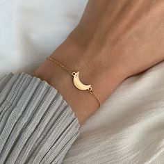 Moon Bracelet Gold Charm on Gold chain for Women 14K Gold Crescent Moon by Negru Jewelry online store Adjustable Gold Moon Bracelets, Adjustable Gold Bracelets With Moon Charm, Dainty Crescent Bracelet As Gift, Dainty Crescent Bracelet For Gift, Gold Moon-shaped Bracelets As Gift, Dainty Moon Shaped Bracelets As Gift, Gold Moon-shaped Bracelets For Gifts, Adjustable Crescent Gold Bracelets, Gold Moon-shaped Bracelet For Gift