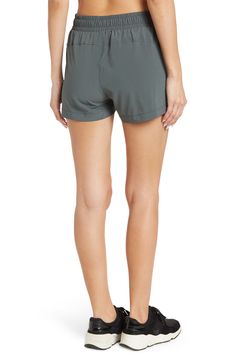 Experience ultimate comfort in these sporty trail shorts designed in a classic mid-rise silhouette. 10" rise, 3" inseam (size S) Elastic waist Pulls on Front slant pockets 88% polyester, 12% spandex Machine wash, tumble dry Imported Model stats: 5'10" height, 32" bust, 25" waist, 36" hip. Model is wearing size S. Lightweight Relaxed Fit Shorts, Athleisure Go-dry Shorts, Outdoor Shorts With 5-inch Inseam And Built-in Shorts, 4-way Stretch Go-dry Shorts, Solid Go-dry Shorts With 4-way Stretch, Workout Shorts With Comfort Waistband And 4-way Stretch, Nylon Athletic Shorts With 4-way Stretch For Outdoor Activities, Running Shorts With Comfort Waistband, Sporty 4-way Stretch Shorts With Comfort Waistband