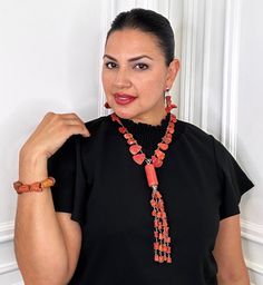 Red Sponge Coral Tassel Necklace Earring Bracelet Set ONE-OF-A-KIND DESIGNMETAL: Stainless Steel APPROX SIZE: 18" Adjustable Length. Earring 2' CLOSURE: Lobster Claw ClaspBracelet APPROX. SIZE: Fits 7"-7.5" Wrist Bracelet CLOSURE: Lobster Claw Clasp Elegant Red Hand-strung Jewelry, Hand-strung Red Coral Jewelry For Gifts, Hand-strung Red Coral Jewelry Gift, Hand-strung Red Coral Jewelry As A Gift, Gift Jewelry With Hand-strung Red Coral, Hand-strung Red Coral Jewelry In Coral Color, Hand-strung Red Coral Jewelry, Orange Red Coral Jewelry With Natural Stones, Orange Jewelry With Natural Stones And Red Coral