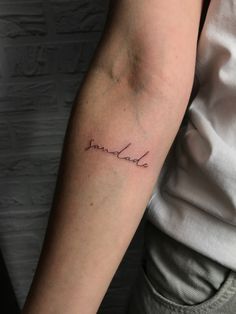 a woman's arm with a tattoo that reads, love and faith on it