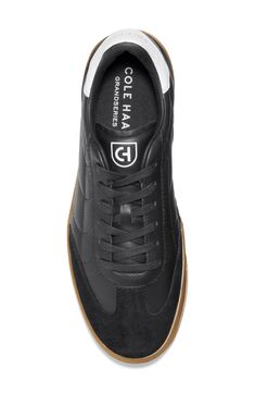 This soccer-inspired sneaker is lightweight and flexible with an anatomical sockliner and padding in the heel for exceptional fit and comfort. Lace-up style Cushioned EVA footbed with arch support Leather upper, textile lining & rubber sole Imported Black High-top Sneakers With Contrast Sole, Dynamic Black Running Shoes With Contrast Sole, White Sole Running Shoes With Contrast Sole For Sports, Sports Running Shoes With Contrast Sole, Functional Black Sneakers With Contrast Sole, Sporty Black Sneakers With Contrast Sole, Sporty High-top Running Sneakers With Branded Insole, Sporty High-top Sneakers For Running With Branded Insole, Functional Running Shoes With Contrast Sole