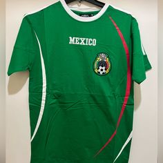 a mexico soccer jersey hanging on a wall