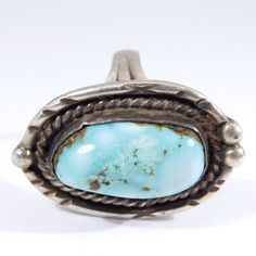 This ring has a wonderful design! Attributed to Navajo but no markings, acid tests sterling silver and the color of the turquoise is a wonderful light blue that is hard to find! Measures 1.25 inches by ¾ inch and it is a size 6 and weighs 12.5 grams. Very good condition. Nice quality to this one, if you want a great size wearable vintage turquoise ring this is an excellent example. Collectible Untreated Blue Turquoise Ring, Southwestern Style Untreated Blue Turquoise Ring, Untreated Blue Turquoise Western Ring, Western Style Stamped 925 Turquoise Ring, Vintage Turquoise Ring, Vintage Turquoise, Blue Turquoise, Turquoise Blue, Turquoise Ring