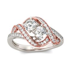 a white and rose gold ring with diamonds