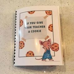 a book with an image of a mouse and cookies on the cover that says if you give your teacher a cookie