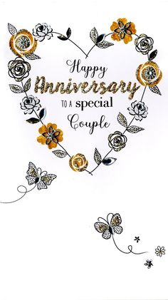 an anniversary card with flowers in the shape of a heart and words happy anniversary to special couple