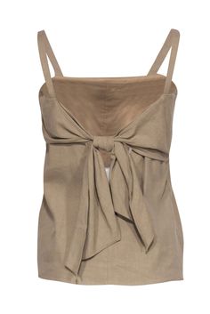 This fresh and modern top by Theory is a must have for your summer wardrobe! The darling bow tie back adds a charming element to the simple silhouette. Pop this breezy linen top on with a pair of jeans and a pair of sneakers for a casual ensemble. Size S Shell: 55% Linen, 41% Lyocell, 4% Elastane Lining: 100% Cotton Bow tie back closure Fully lined Flare silhouette Sleeveless Bust 32" Waist 34" Shoulder to hem 23" Indian Wedding Outfit, French Girl Chic, Open Back Tank, Modern Tops, Simple Silhouette, Chic Shop, Buy Shoes Online, French Girl, Linen Top