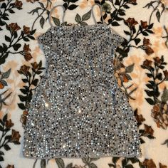 H&M Silver Sequin Dress Size: Medium New W Tags Send Offers:) Silver Sparkling Sequin Dress For Spring, Sparkling Silver Sequin Dress For Spring, Silver Mini Sequin Dress For Party Season, Silver Sequin Mini Dress For Party Season, Silver Sparkling Sequin Dress For Summer, Silver Mini Sequin Dress, Silver Shiny Mini Dress For Party Season, Silver Mini Dress For Spring Holiday Party, Spring Silver Sequin Dress With Shimmer