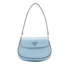 Prada's Cleo is made of light blue leather. It is worn in the hand or on the arm with an adjustable flat leather strap. It has a front flap with magnetic closure and slip pockets inside. Prada Cleo, Miuccia Prada, Vuitton Bag, Fashion Labels, Leather Goods, Blue Bags, Italian Fashion, Blue Leather, Magnetic Closure