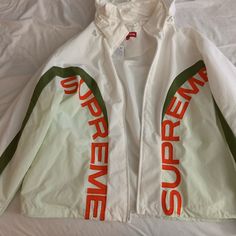 Brand New Supreme Jacket. Rare And High Quality. 100% Authentic With Tags. No Rips Or Stains Urban White Track Jacket With Pockets, White Hooded Track Jacket With Pockets, White Windbreaker For Winter Streetwear, White Track Jacket With Pockets For Fall, White Sporty Windbreaker With Pockets, Sporty White Windbreaker With Pockets, Casual White Hooded Windbreaker, White Long Sleeve Windbreaker For Winter, Casual White Long Sleeve Windbreaker