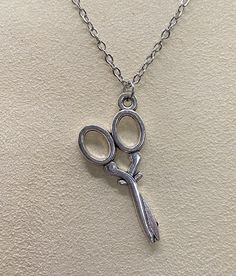 Pair of scissors charm, made from metal alloy. Charm is about an inch long (see pics). Chain is 18 inches and stainless steel. Charm Necklaces, Favorite Jewelry, Charm Necklace, Necklace Etsy, Accessory Gift, Charms, Jewelry Necklaces, Electronic Accessories, Necklaces