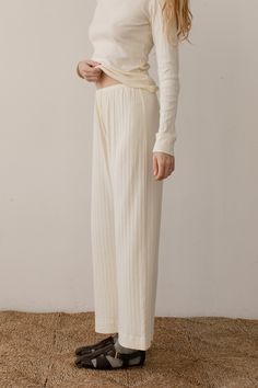 The Pointelle Simple Crop Pant is crafted with 100% Organic Cotton, featuring a cropped fit, wide leg and elastic waist. Made in Los Angeles Wide-leg Pants With Elastic Waistband For Daywear, White Wide Leg Harem Pants For Loungewear, Chic Wide Leg Trousers For Loungewear, Chic Wide Leg Loungewear Trousers, Chic Loungewear Wide Leg Trousers, Beige Harem Pants For Spring Loungewear, Fall Loungewear Wide Leg Harem Pants, Cream Stretch Long Pants, Relaxed Fit Wide Leg Harem Pants For Loungewear