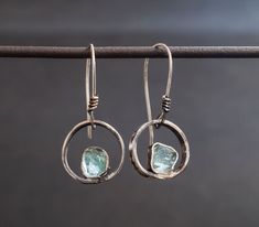 "Silver dangle earrings Blue stone earrings Silver earrings for women Circle dangle drop Sterling jewelry Rustic silver Raw stone apatite ATTENTION: Each stone is identical and different in shape. That's why every pair of earrings will be unique and still beautiful. Sizes are about 3/4 \"But trust me the earrings will still be lovely. Thanks Blue Apatite is a motivational stone, promoting independence and ambitiousness. A stone of the Throat Chakra, Blue Apatite helps with public speaking and en Silver And Stone Jewelry, Silver Earrings With Stones, Silver Jewelry With Stones, Women Circle, Blue Stone Earrings, Jewelry Rustic, Women's Circle, Bold Jewelry, Rustic Jewelry