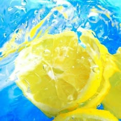 some lemons that are floating in the water