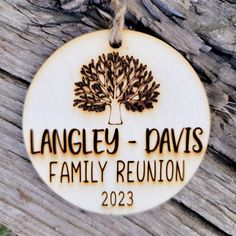 a family reunion ornament hanging from a tree